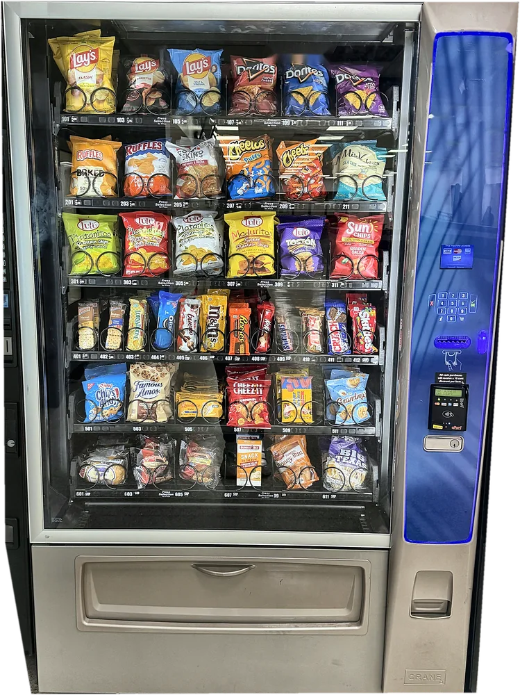 Snack machine with chips, plantain chips, cookies and candy, with a contactless card reader.